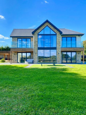 Stunning modern home set in beautiful grounds.